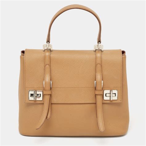 prada saffiano lux top handle beige|Prada handbags.